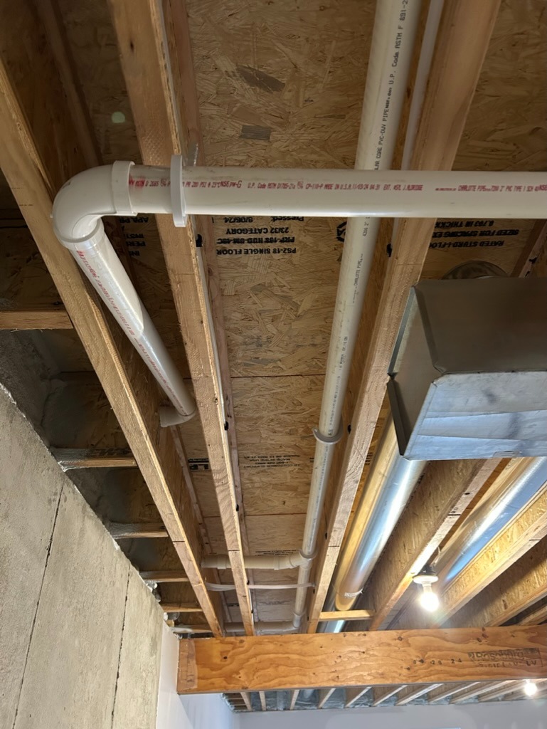 PVC drain pipe installation with bends